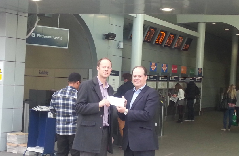 Dan Watkins and Stephen Hammond MP at Earlsfield train station
