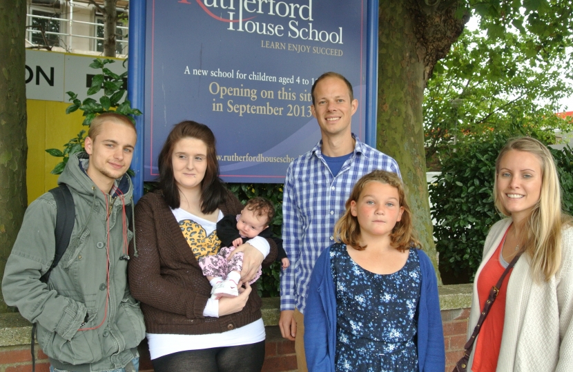 Dan with local residents outside Rutherford School