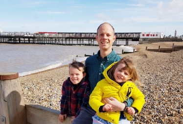 Dan and children on Herne Bay beach
